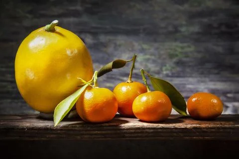 Bunch of Citruses In Sharp Light on Shelf2 Stock Photos