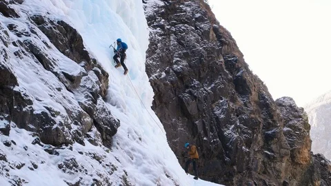Bunch of climbers on icy wall Stock Footage 87467484