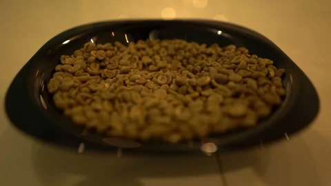 A bunch of coffee beans in the black plate Stock Footage 125927225