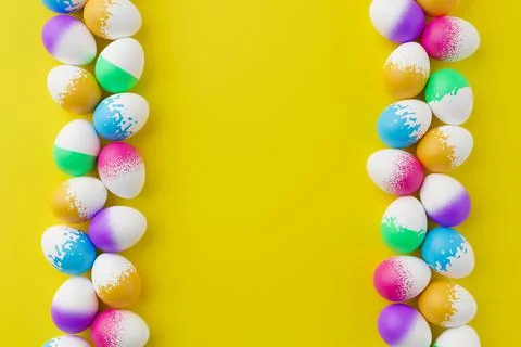 Bunch of colorful eggs on a yellow Easter background 3D Rendering. Pile of bi 스톡 일러스트