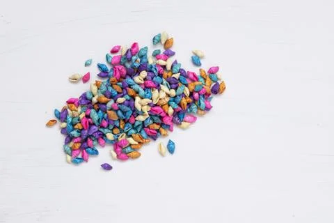 A bunch of colorful shells, top view. White background. background and texture Foto stock