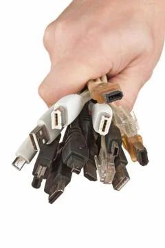 Bunch of computer cables with  sockets in hand Stock Photos