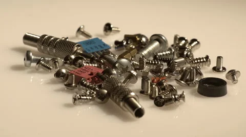 A bunch of computer screws in grey tones Stock Footage 62084516