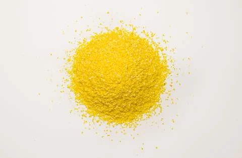 A bunch of corn grits on a white background from above Stock Photos