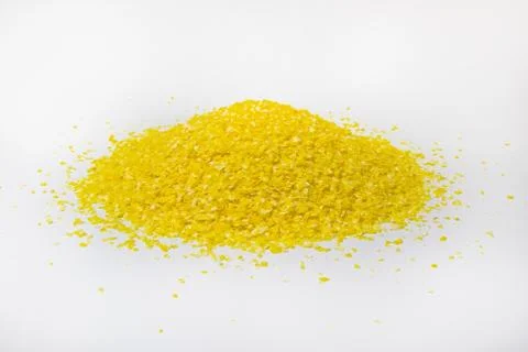 A bunch of corn grits on a white background side view Stock Photos