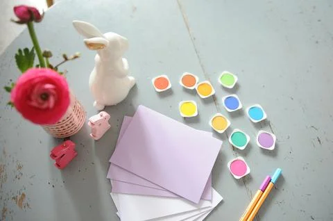 A bunch of craft supplies on a table Stock Photos