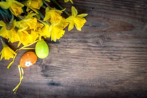 Bunch of daffodils with easter eggs for Easter Stock Photos