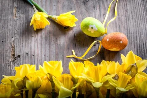 Bunch of daffodils with easter eggs for Easter Stock Photos