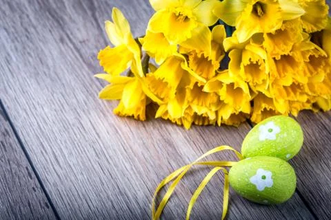 Bunch of daffodils with easter eggs for Easter Stock Photos