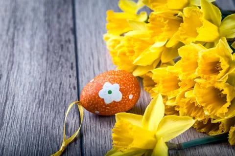 Bunch of daffodils with easter eggs for Easter Stock Photos