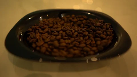 A bunch of Dark coffee beans in the plate Stock Footage 125927310