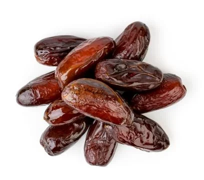 A bunch of dates on a white. The view from the top. Stock Photos