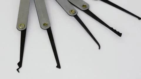 Bunch of different pinlocks rotate isolated on white Stock Footage 276375733