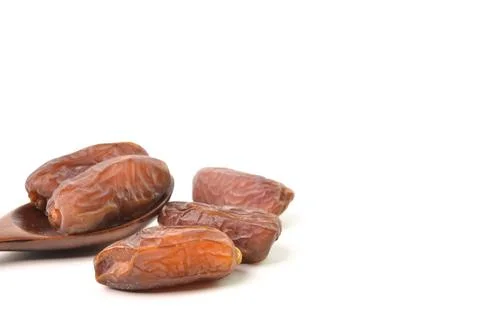 Bunch of dried dates or kurma isolated on a white background Stock Photos