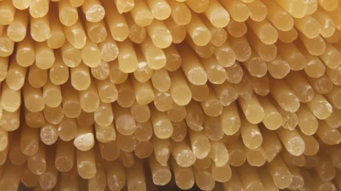 Bunch of dried spaghetti macro shot. Food background Stock Footage 127827056