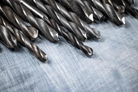 A bunch of drilled on the table. Stock Photos