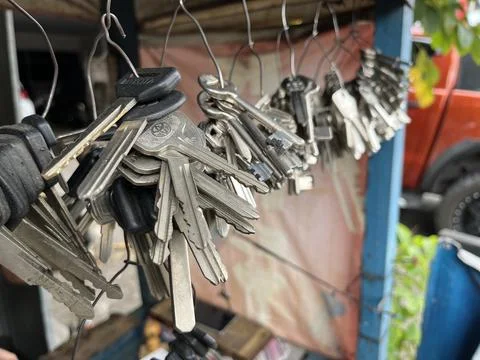Bunch of duplicate keys with key chain in a locksmith's shop Stock Photos