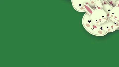 Bunch of easter bunnies on rabbits pink ears group isolated isolated on green Stock Footage 336890171