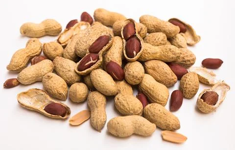 Bunch of ecological peanuts on a white background Stock Photos