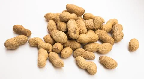 Bunch of ecological peanuts on a white background Stock Photos