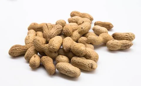 Bunch of ecological peanuts on a white background Stock Photos