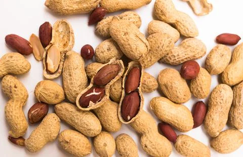 Bunch of ecological peanuts on a white background Stock Photos