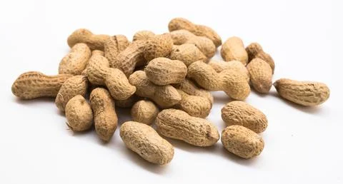 Bunch of ecological peanuts on a white background Stock Photos