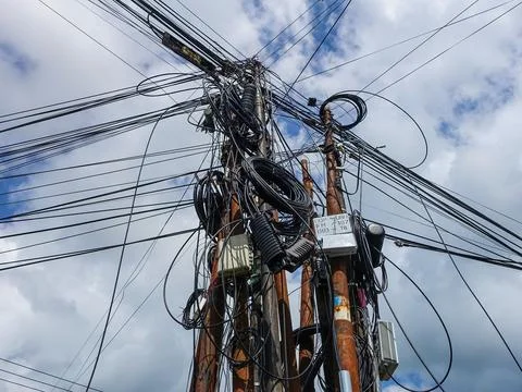 Bunch of electrical wires in Bali Stock Photos