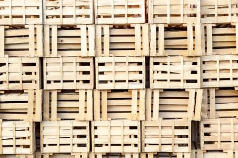Bunch of empty wooden boxes stack at each other. Stockfoto's
