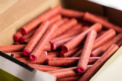 A bunch of firecrackers with red sulfur. Set of pyrotechnics, explosion hazard Stock Photos