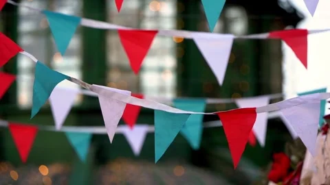 A bunch of flags are hanging from the ceiling Stock Footage 304286489