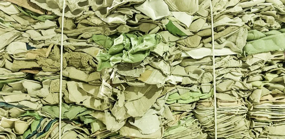 A bunch of flattened cardboard egg boxes for recycling Stock Photos