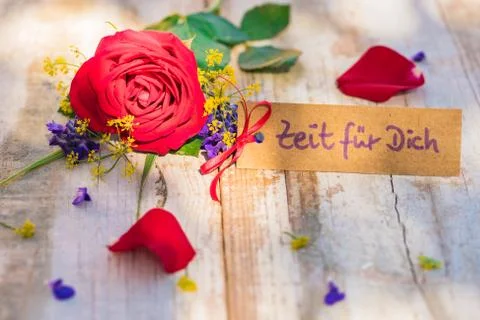 Bunch of flowers with gift card for timeout Stock Photos