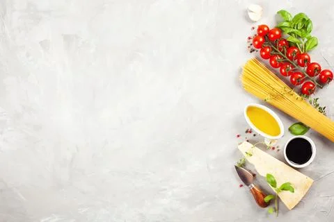 Bunch of fresh basil, tomatoes, parmesan cheese, garlic and olive oil - tradi Stock Photos