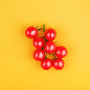 Bunch of fresh cherry tomatoes. Stock Photos