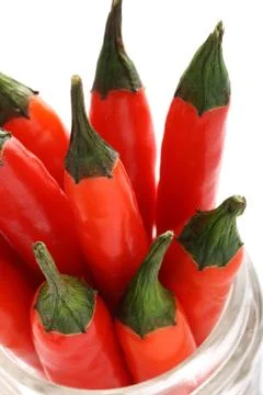 Bunch of fresh red hot chilli chilies pepper super macro shot Stock Photos