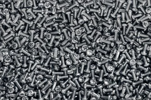 Bunch of galvanized stainless bolts with button head, hardware background, si Foto stock