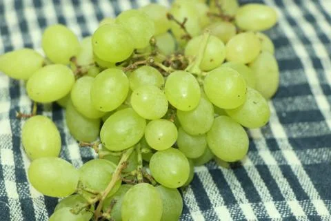 Bunch of a grapes or a fig Stock Photos