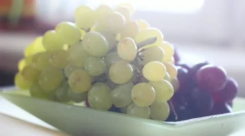 Bunch of grapes on a plate Stock Footage 10891249