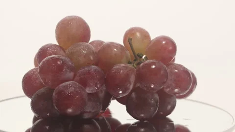 A bunch of grapes on a turntable Stock Footage 249972912