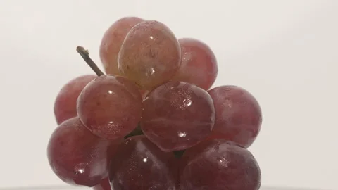 A bunch of grapes on a turntable Stock Footage 249972916