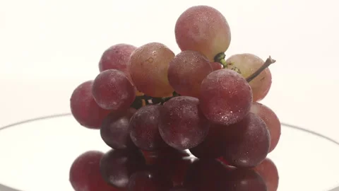 A bunch of grapes on a turntable Stock Footage 249972987
