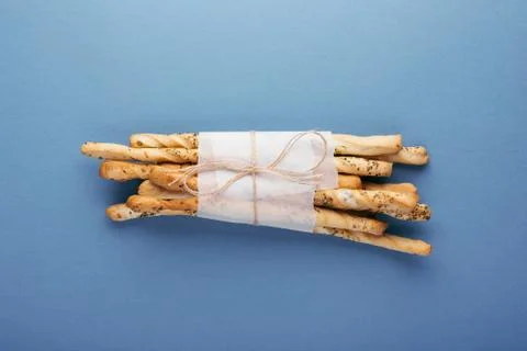 A bunch of grissini on the table. Stock Photos