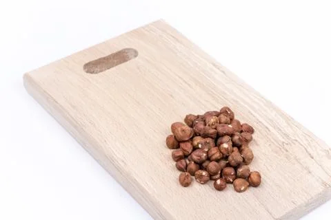 Bunch of hazelnut on the cutting board Stock Photos