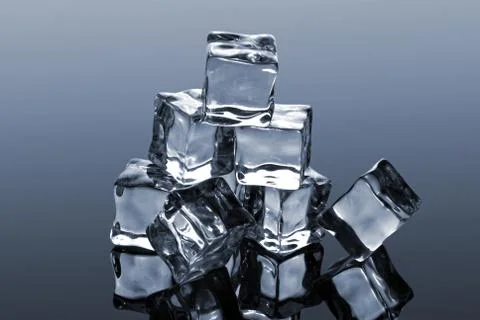 A bunch of ice cubes isolated on gray gradient background Foto stock