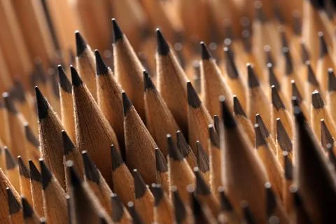 Bunch of identical graphite pencils Foto stock