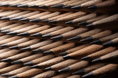 Bunch of identical graphite pencils Stock Photos