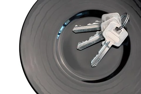 Bunch of keys in a black sauser Stock Photos