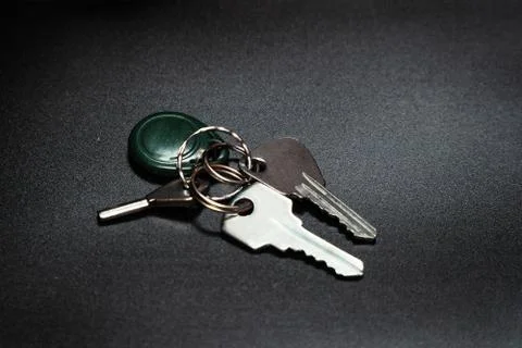 A bunch of keys on a dark background Stock Photos
