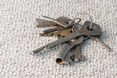 Bunch of keys on fabric Stock Photos